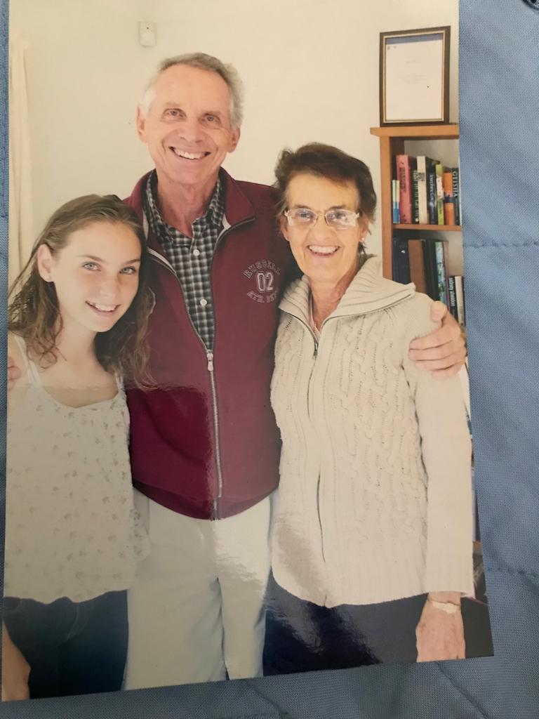 Happy Griffiths with his wife and granddaughter