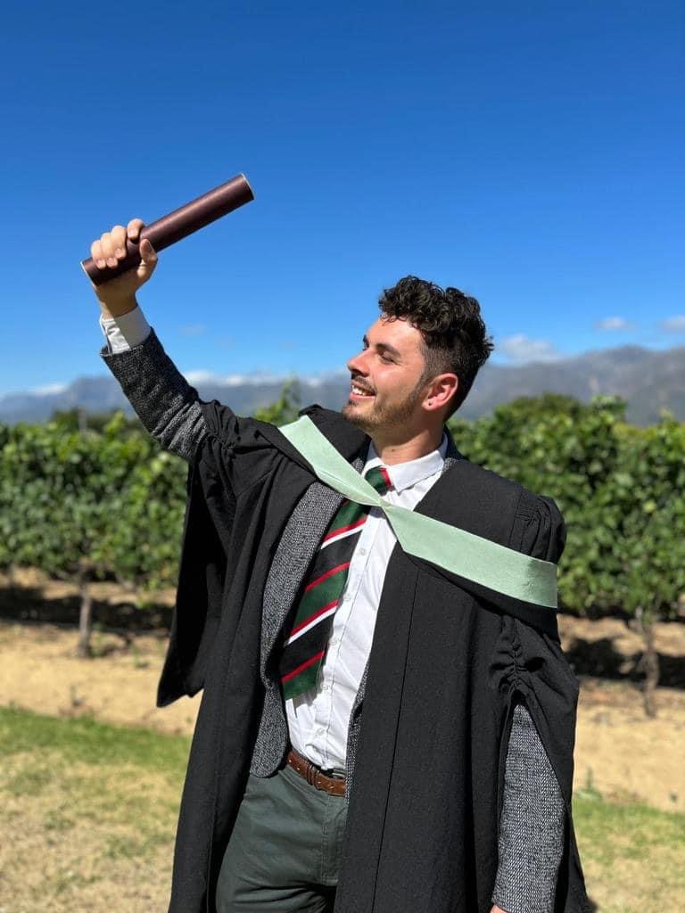 Glen Thatcher proudly wearing his PBHS Old Boys' Tie at Graduation